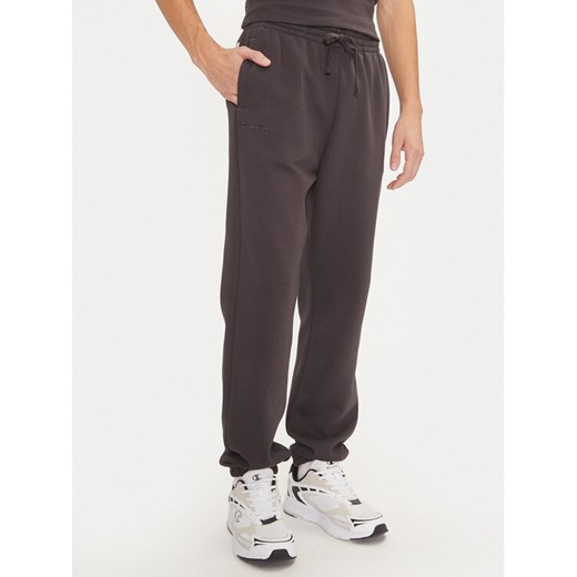 Champion Spodnie dresowe 220424 Szary Regular Fit ze sklepu MODIVO w kategorii Spodnie męskie - zdjęcie 182626292