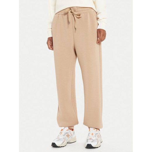 United Colors Of Benetton Spodnie dresowe 3PKLDF016 Beżowy Relaxed Fit ze sklepu MODIVO w kategorii Spodnie damskie - zdjęcie 182628043