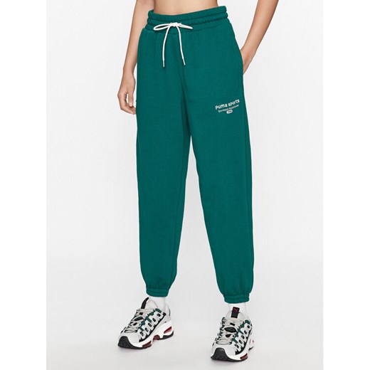 Puma Spodnie dresowe Puma Team 621442 Zielony Regular Fit ze sklepu MODIVO w kategorii Spodnie damskie - zdjęcie 182628314
