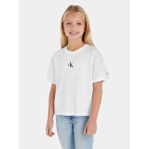 Calvin Klein Jeans T-Shirt IG0IG02136 Biały Boxy Fit ze sklepu MODIVO w kategorii Bluzki dziewczęce - zdjęcie 182628664