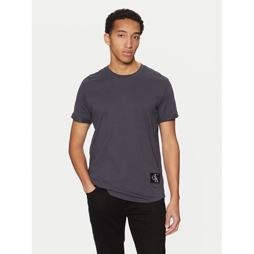Calvin Klein Jeans T-Shirt J30J323482 Granatowy Regular Fit ze sklepu MODIVO w kategorii T-shirty męskie - zdjęcie 182629030