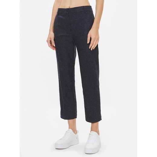 Tommy Hilfiger Chinosy Neppy WW0WW41179 Granatowy Slim Fit ze sklepu MODIVO w kategorii Spodnie damskie - zdjęcie 182629231