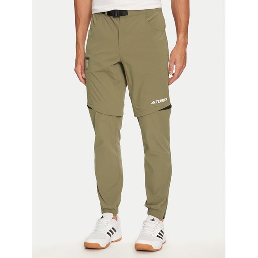 adidas Spodnie outdoor Terrex Utilitas IQ3505 Zielony Regular Fit ze sklepu MODIVO w kategorii Spodnie męskie - zdjęcie 182629710
