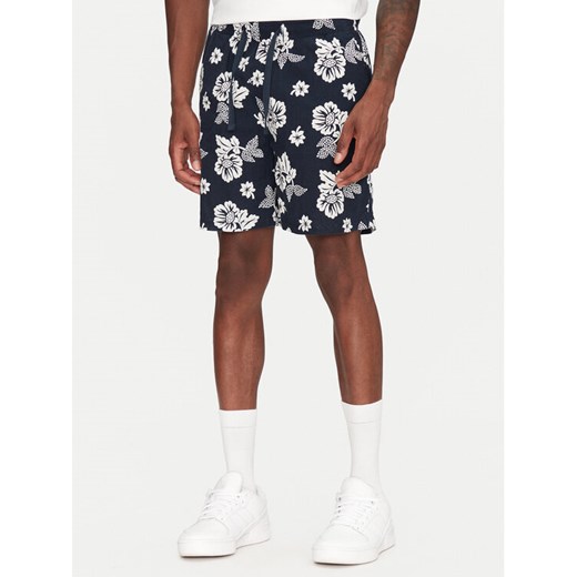 Tommy Hilfiger Szorty materiałowe Slub Aop Beach DM0DM21947 Granatowy Regular Fit ze sklepu MODIVO w kategorii Spodenki męskie - zdjęcie 182629711