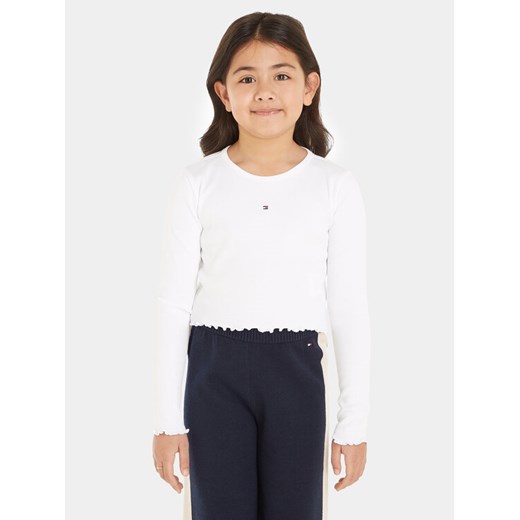 Tommy Hilfiger Bluzka Essential KG0KG07595 Biały Regular Fit ze sklepu MODIVO w kategorii Bluzki dziewczęce - zdjęcie 182629840