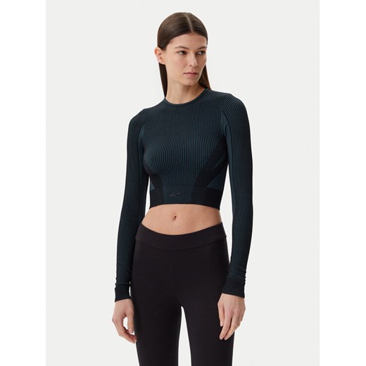 Reebok Koszulka techniczna LAB Seamless 118570 Czarny Slim Fit ze sklepu MODIVO w kategorii Bluzki damskie - zdjęcie 182629852