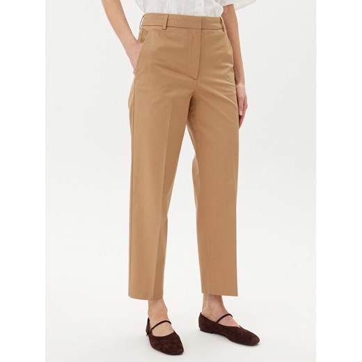 Tommy Hilfiger Chinosy WW0WW40504 Beżowy Regular Fit ze sklepu MODIVO w kategorii Spodnie damskie - zdjęcie 182629934