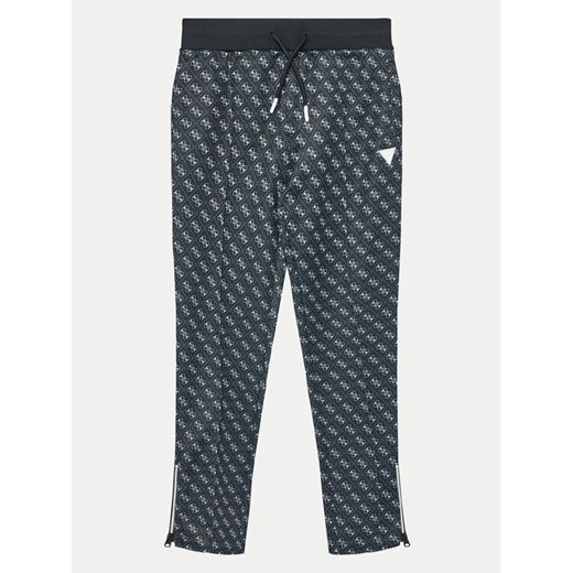 Guess Spodnie dresowe L4YQ18 FL04Q Czarny Relaxed Fit ze sklepu MODIVO w kategorii Spodnie chłopięce - zdjęcie 182629964