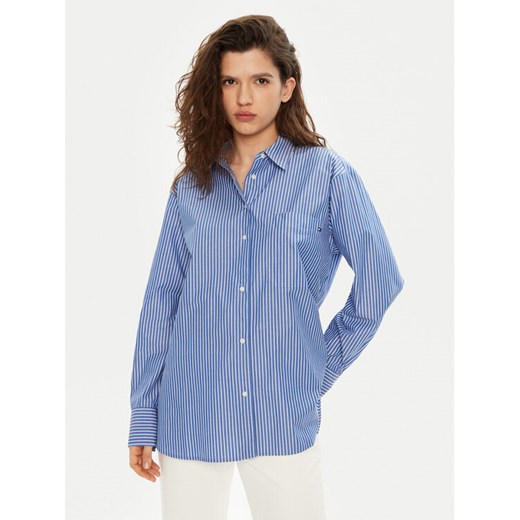 Tommy Hilfiger Koszula WW0WW45612 Niebieski Relaxed Fit ze sklepu MODIVO w kategorii Koszule damskie - zdjęcie 182630272