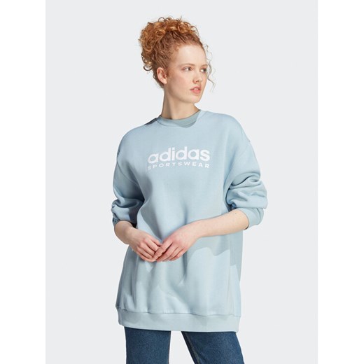 adidas Bluza ALL SZN Fleece Graphic IL3248 Błękitny Loose Fit ze sklepu MODIVO w kategorii Bluzy damskie - zdjęcie 182630321