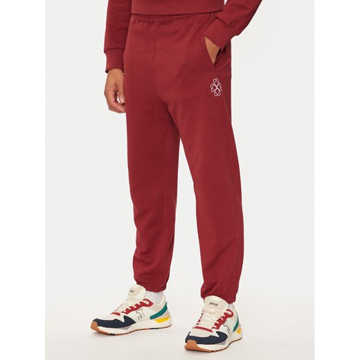 United Colors Of Benetton Spodnie dresowe 342ZUF01D Bordowy Regular Fit ze sklepu MODIVO w kategorii Spodnie męskie - zdjęcie 182630603