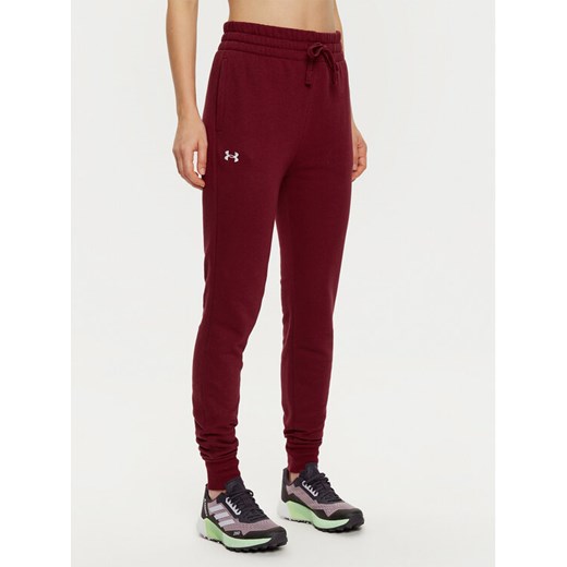 Under Armour Spodnie dresowe Ua Rival Fleece Jogger 1379438 Bordowy Loose Fit ze sklepu MODIVO w kategorii Spodnie damskie - zdjęcie 182631462