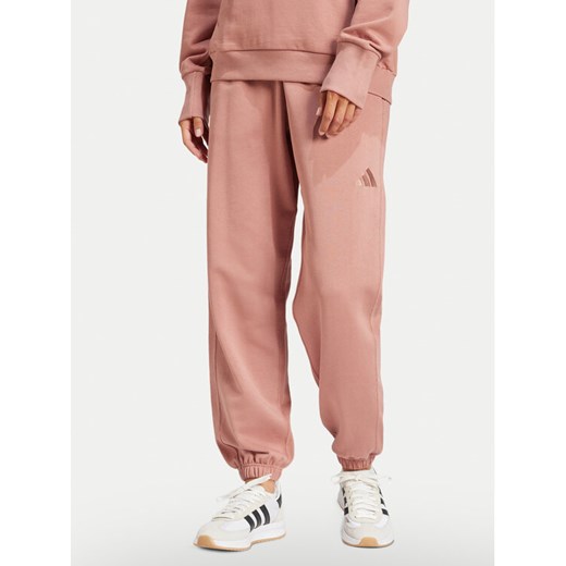 adidas Spodnie dresowe ALL SZN French Terry JD4721 Różowy Loose Fit ze sklepu MODIVO w kategorii Spodnie damskie - zdjęcie 182631721