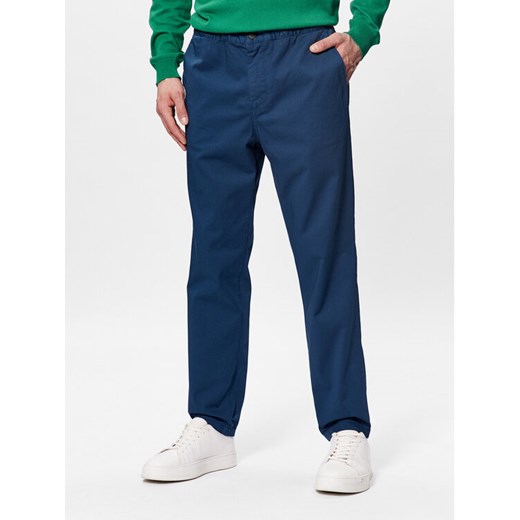 United Colors Of Benetton Spodnie materiałowe 4UN4UF01N Niebieski Slim Fit ze sklepu MODIVO w kategorii Spodnie męskie - zdjęcie 182631894