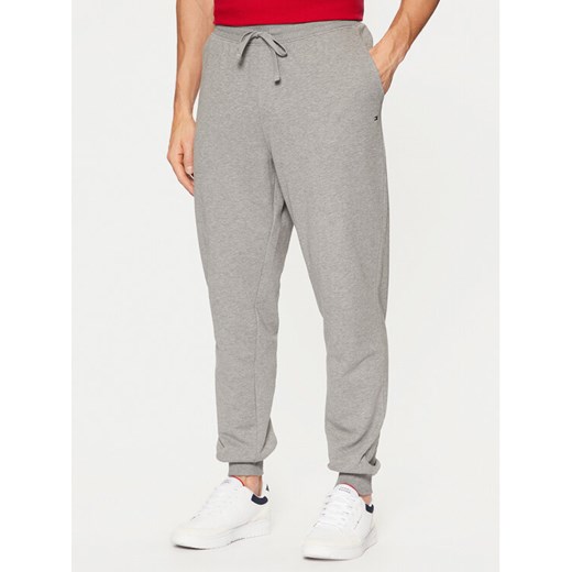 Tommy Hilfiger Spodnie dresowe Terry MW0MW37236 Szary Regular Fit ze sklepu MODIVO w kategorii Spodnie męskie - zdjęcie 182632230