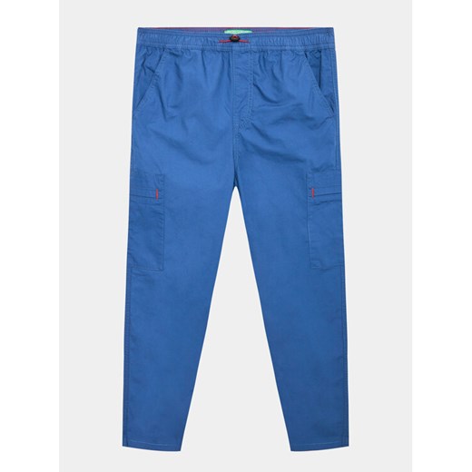 United Colors Of Benetton Spodnie materiałowe 4AC7CF01X Niebieski Regular Fit ze sklepu MODIVO w kategorii Spodnie chłopięce - zdjęcie 182632902