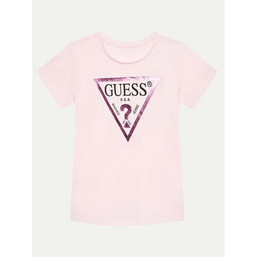 Guess T-Shirt J73I56K 8HM0 Różowy Regular Fit ze sklepu MODIVO w kategorii Bluzki dziewczęce - zdjęcie 182633460