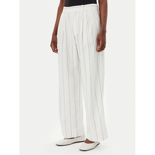 Gap Spodnie materiałowe 713998-01 Écru Wide Leg ze sklepu MODIVO w kategorii Spodnie damskie - zdjęcie 182634913