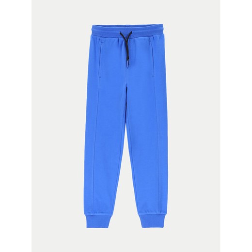 Coccodrillo Spodnie dresowe ZC4120104VBA Niebieski Slim Fit ze sklepu MODIVO w kategorii Spodnie chłopięce - zdjęcie 182635094