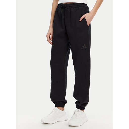 adidas Spodnie dresowe ALL SZN Fleece IW1024 Czarny Loose Fit ze sklepu MODIVO w kategorii Spodnie damskie - zdjęcie 182635484