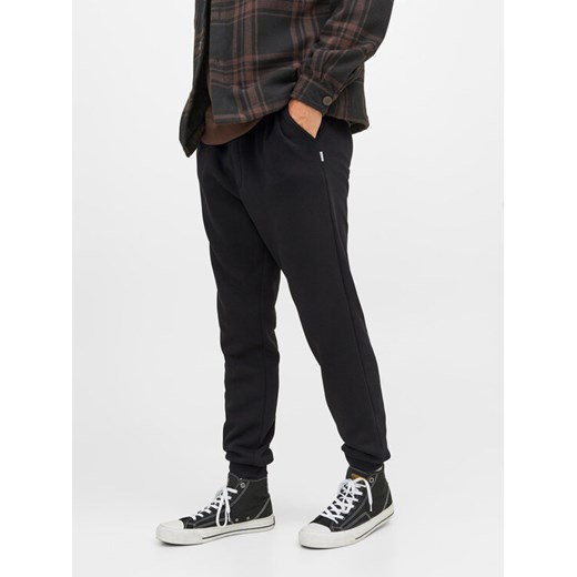 Jack&Jones Spodnie dresowe Gordon 12249274 Czarny Regular Fit ze sklepu MODIVO w kategorii Spodnie męskie - zdjęcie 182635984