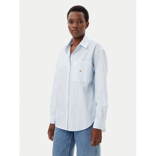 Calvin Klein Jeans Koszula J20J224436 Błękitny Relaxed Fit ze sklepu MODIVO w kategorii Koszule damskie - zdjęcie 182636913