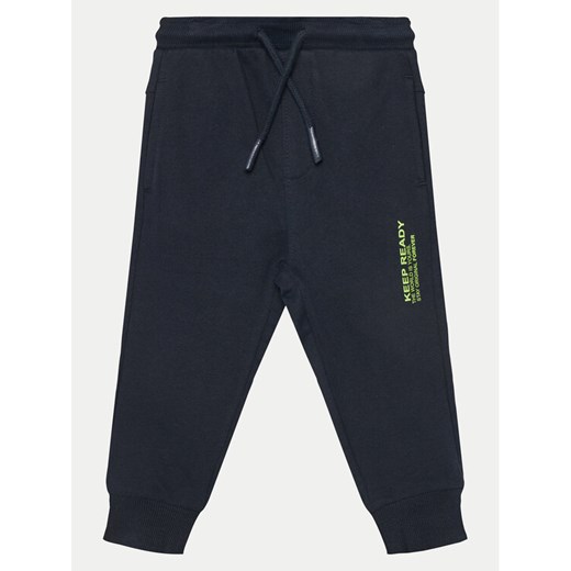 Coccodrillo Spodnie dresowe WC5120101VBA Granatowy Regular Fit ze sklepu MODIVO w kategorii Spodnie chłopięce - zdjęcie 182637890
