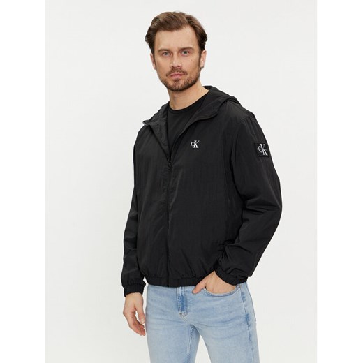 Calvin Klein Jeans Wiatrówka J30J325106 Czarny Regular Fit ze sklepu MODIVO w kategorii Kurtki męskie - zdjęcie 182638292