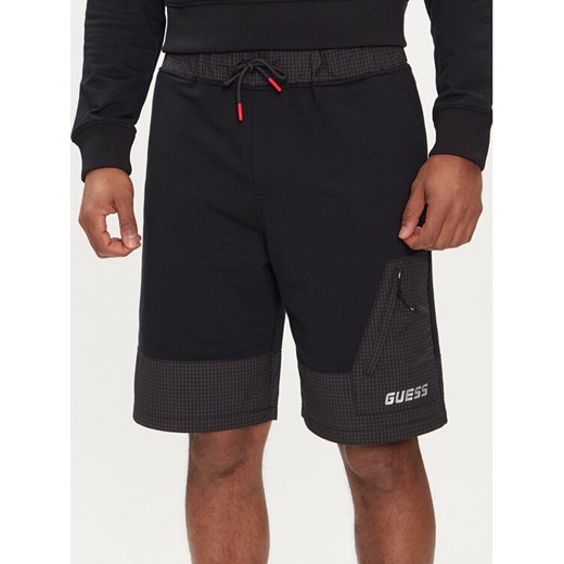 Guess Szorty sportowe Z4GD00 KC532 Czarny Regular Fit ze sklepu MODIVO w kategorii Spodenki męskie - zdjęcie 182639170