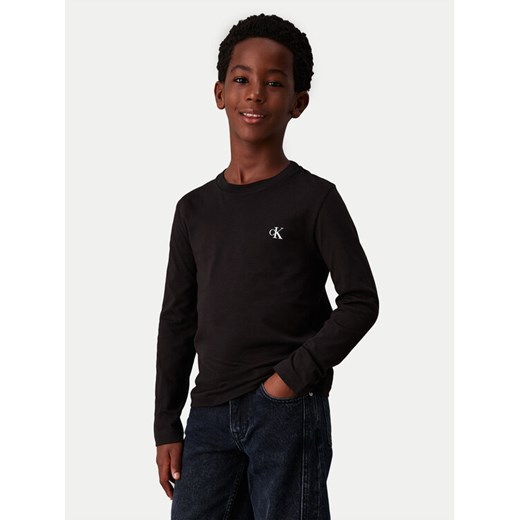 Calvin Klein Jeans Komplet 2 bluzek IB0IB02255 D Czarny Regular Fit ze sklepu MODIVO w kategorii T-shirty chłopięce - zdjęcie 182640051