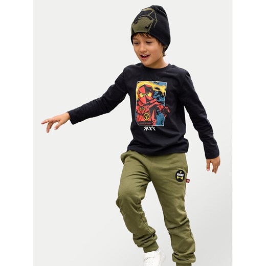 LEGO Spodnie dresowe Ninjago 12011289 Zielony Regular Fit ze sklepu MODIVO w kategorii Spodnie chłopięce - zdjęcie 182640120