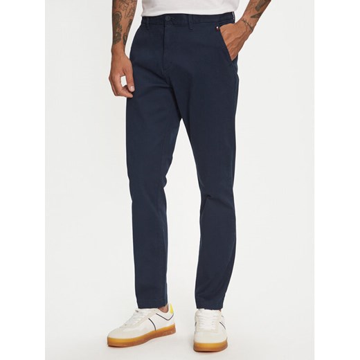 Tommy Jeans Chinosy Austin DM0DM20445 Granatowy Slim Fit ze sklepu MODIVO w kategorii Spodnie męskie - zdjęcie 182640353