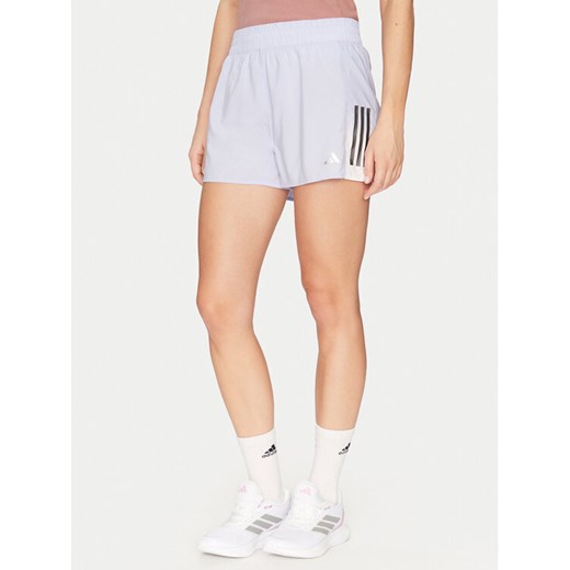 adidas Szorty sportowe Own the Run Colorblock JP0831 Fioletowy Regular Fit ze sklepu MODIVO w kategorii Szorty - zdjęcie 182641243