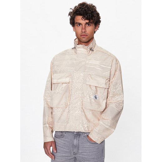 Calvin Klein Jeans Kurtka przejściowa J30J322944 Beżowy Regular Fit ze sklepu MODIVO w kategorii Kurtki męskie - zdjęcie 182642522