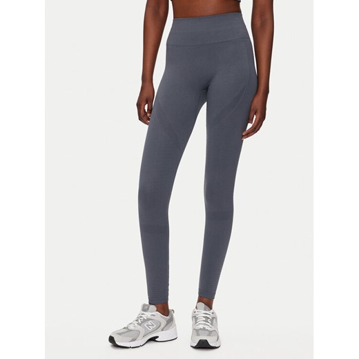 Athlecia Legginsy Nagar W Seamless EA203352 Niebieski Slim Fit ze sklepu MODIVO w kategorii Spodnie damskie - zdjęcie 182643912