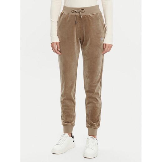 Guess Spodnie dresowe V3BB27 KBXI2 Brązowy Regular Fit ze sklepu MODIVO w kategorii Spodnie damskie - zdjęcie 182644272