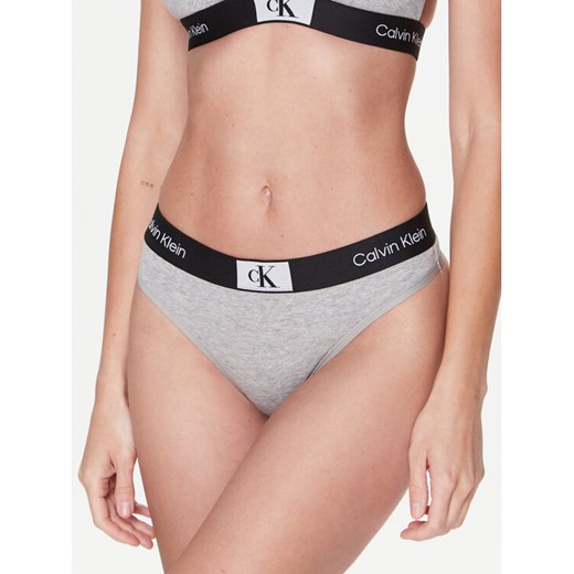 Calvin Klein Underwear Stringi 000QF7221E Szary ze sklepu MODIVO w kategorii Majtki damskie - zdjęcie 182644894