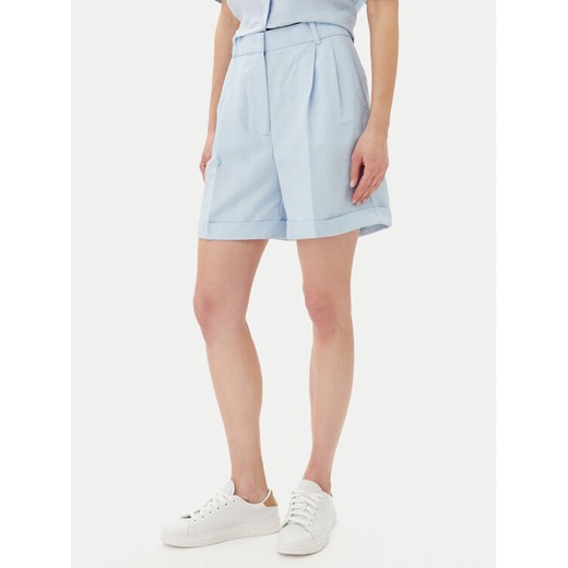 Tommy Hilfiger Szorty materiałowe WW0WW44767 Błękitny Regular Fit ze sklepu MODIVO w kategorii Szorty - zdjęcie 182645260