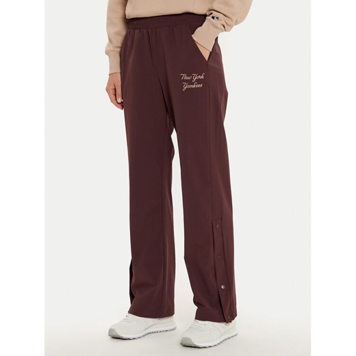 Champion Spodnie dresowe 117511 Brązowy Wide Leg ze sklepu MODIVO w kategorii Spodnie damskie - zdjęcie 182645290