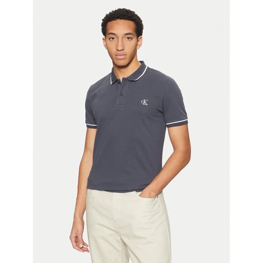 Calvin Klein Jeans Polo J30J315603 Granatowy Slim Fit ze sklepu MODIVO w kategorii T-shirty męskie - zdjęcie 182645482