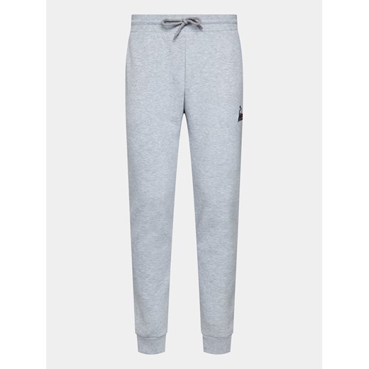 Le Coq Sportif Spodnie dresowe 2310346 Szary Slim Fit ze sklepu MODIVO w kategorii Spodnie męskie - zdjęcie 182645592