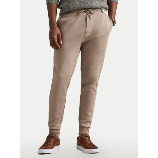 Polo Ralph Lauren Spodnie dresowe 710881518046 Beżowy Regular Fit ze sklepu MODIVO w kategorii Spodnie męskie - zdjęcie 182646214