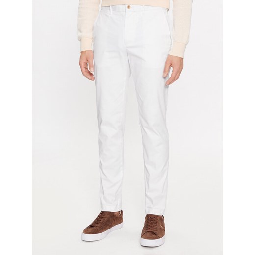 Tommy Hilfiger Chinosy Bleecker MW0MW26619 Biały Slim Fit ze sklepu MODIVO w kategorii Spodnie męskie - zdjęcie 182647623