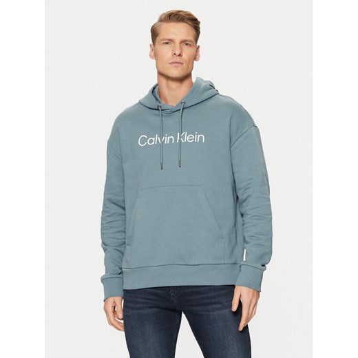 Calvin Klein Bluza Hero Logo Comfort Hoodie K10K111345 Niebieski Regular Fit ze sklepu MODIVO w kategorii Bluzy męskie - zdjęcie 182647731