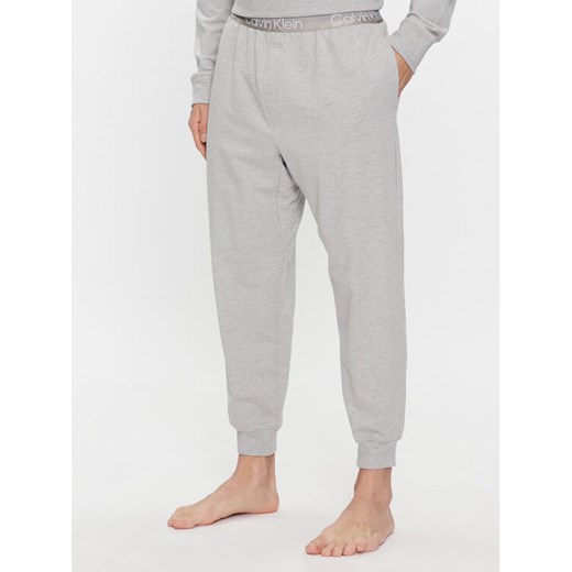 Calvin Klein Underwear Spodnie piżamowe 000NM2175E Szary Relaxed Fit ze sklepu MODIVO w kategorii Piżamy męskie - zdjęcie 182647903