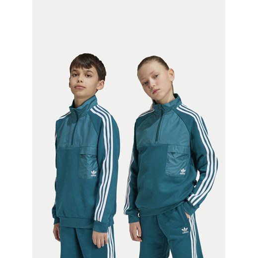 adidas Bluza IY0012 Turkusowy Relaxed Fit ze sklepu MODIVO w kategorii Bluzy chłopięce - zdjęcie 182648883