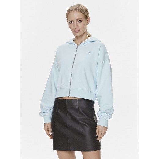 Calvin Klein Jeans Bluza J20J222885 Niebieski Relaxed Fit ze sklepu MODIVO w kategorii Bluzy damskie - zdjęcie 182649374