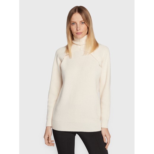 Calvin Klein Golf K20K205092 Écru Relaxed Fit ze sklepu MODIVO w kategorii Swetry damskie - zdjęcie 182649523