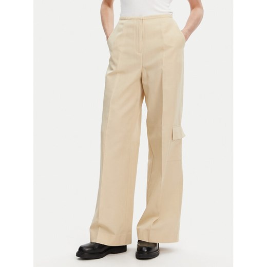 Calvin Klein Spodnie materiałowe K20K208168 Beżowy Wide Leg ze sklepu MODIVO w kategorii Spodnie damskie - zdjęcie 182650650