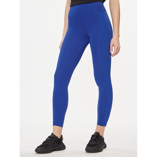 adidas Legginsy All Me IP1214 Niebieski Slim Fit ze sklepu MODIVO w kategorii Spodnie damskie - zdjęcie 182652024